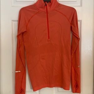 Lululemon orange quarter zip swiftly.